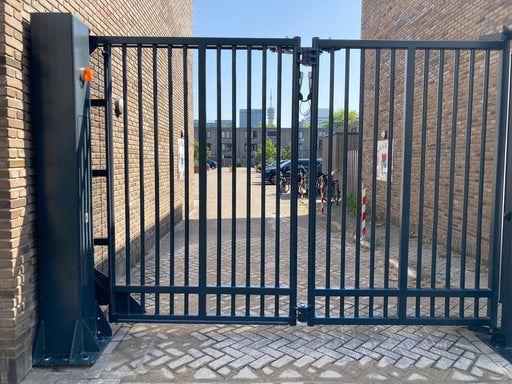 Commercial bi-folding speed gate with fast-opening  panels for secure vehicle access