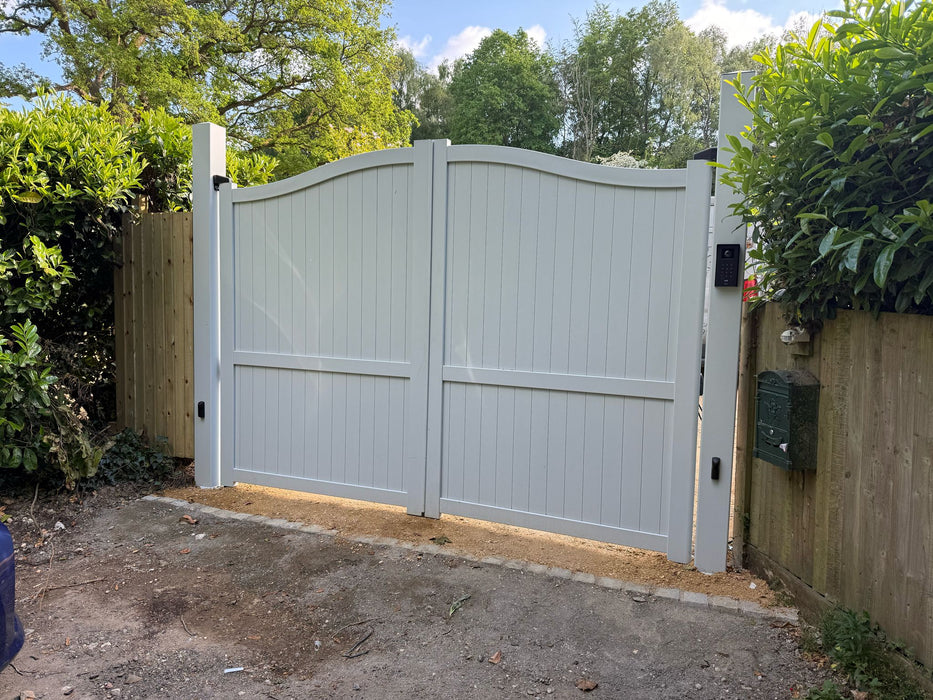 The Abbey aluminium bell curve automatic double swing gate in custom colour finish