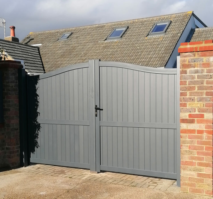 The Abbey manual aluminium bell curve double swing gate with factory-fitted lock in anthracite grey powder-coated finish